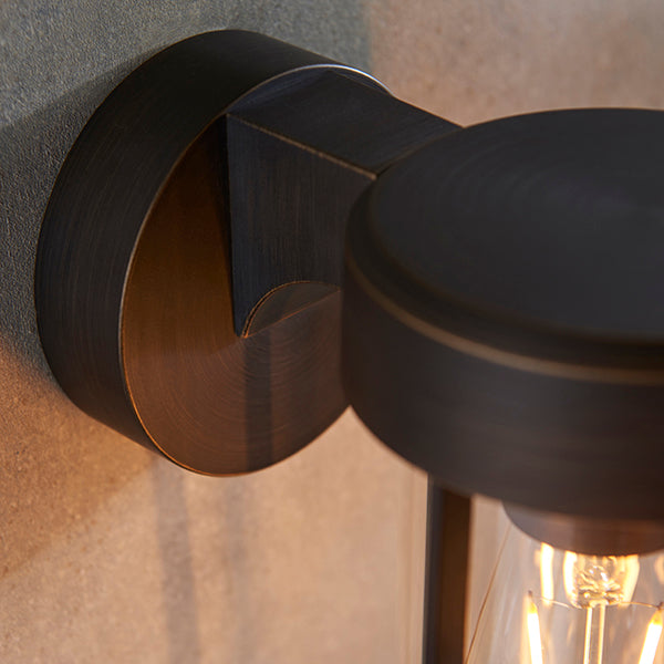 Die-cast IP44 brushed bronze & clear glass E27 wall light