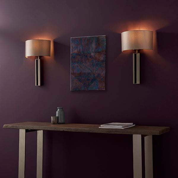 Bronze slotted wall light with mink shade