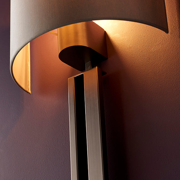 Bronze slotted wall light with mink shade