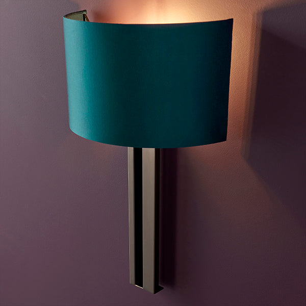 Bronze slotted wall light with teal shade