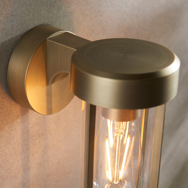 Die-cast IP44 brushed gold & clear glass E27 wall light