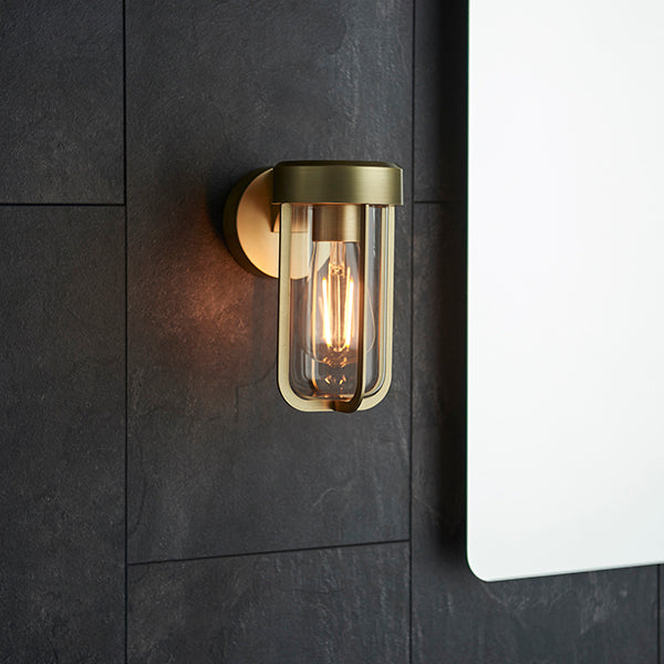 Die-cast IP44 brushed gold & clear glass E27 wall light