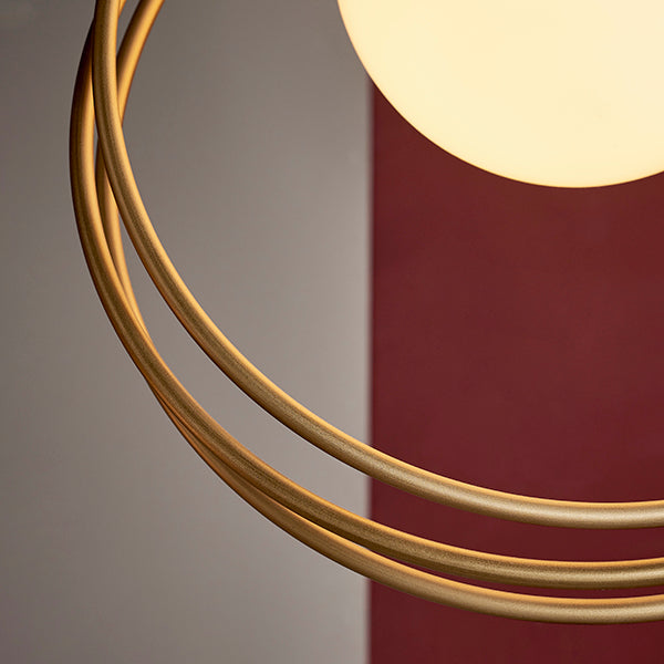 Loop with brushed gold single pendant