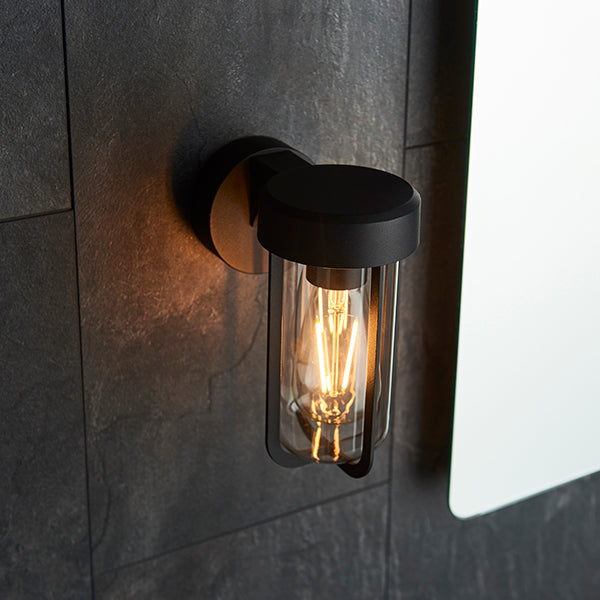Die-cast IP44 black & clear glass E27 wall light