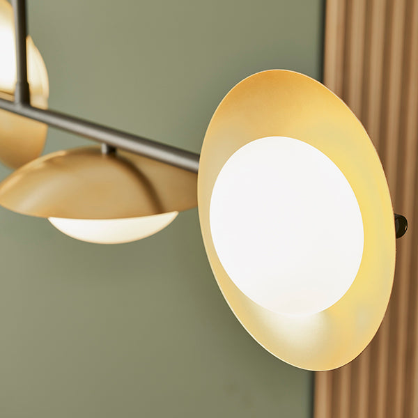 Gold & bronze dish linear pendant with pebble shaped glass