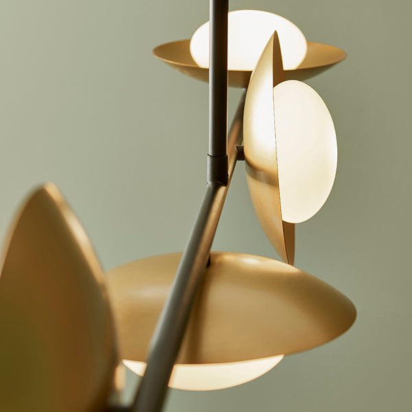 Gold & bronze dish linear pendant with pebble shaped glass