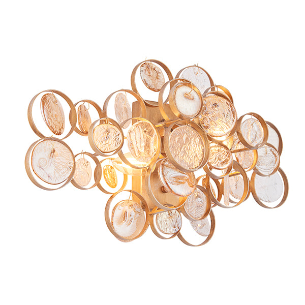 Antique gold wall light with clear and amber glass details