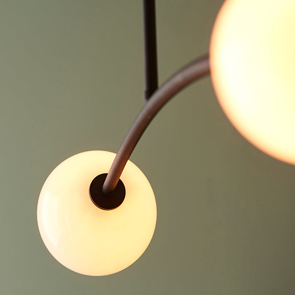 Black ceiling light with 4 opal glass shades