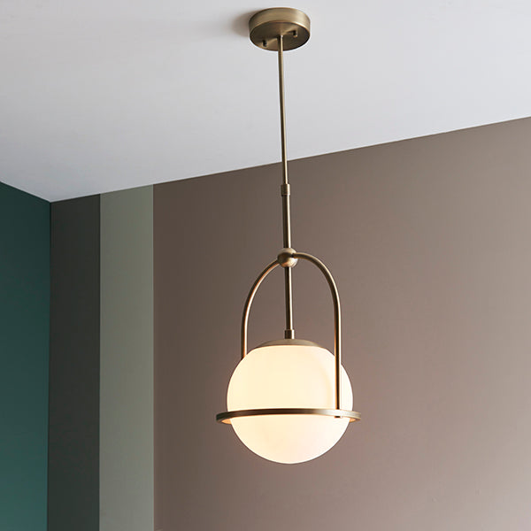 Matt antique brass single pendant with opal glass and adjustable stem