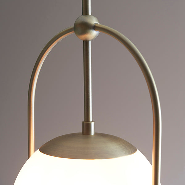 Matt antique brass single pendant with opal glass and adjustable stem