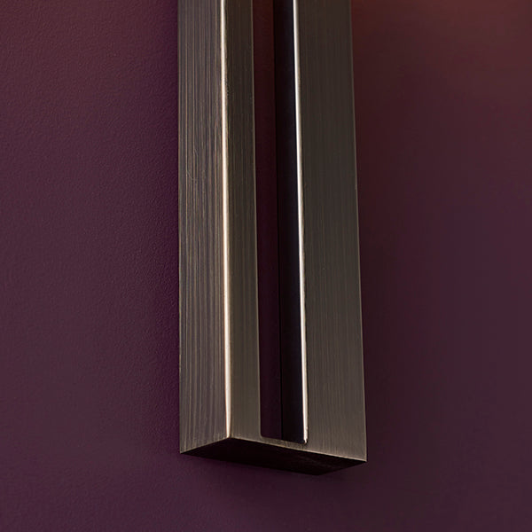 Bronze slotted wall light with mink shade