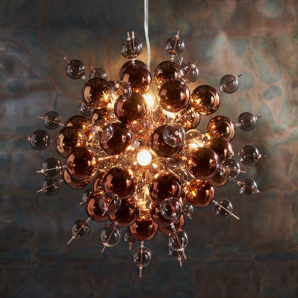 Copper plated pendant with tinted glass spheres