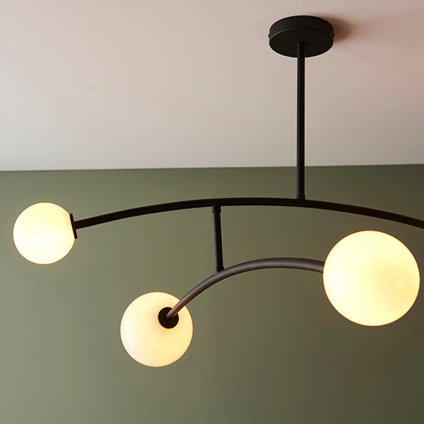 Black ceiling light with 4 opal glass shades
